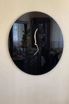 a mirror that is hanging on the wall