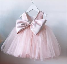 Fancy Baby Girl Princess Pearl Bow Dress ↓↓↓ - Cotton and Mesh Material, Soft, Comfortable and Skin Affinity  - Excellent Workmanship - Vintage Pearl Design, Making A Elegant Princess Pink And Blue Dress Size↓↓↓ Age Size: 12M, 18M, 2T, 3T, 5T, 7T, 10T, 12T; Size(cm): 80, 90, 100, 110, 120, 130, 140, 150; Length(cm): 40, 45, 50, 55, 60, 65, 70, 75; Chest(cm): 24, 26, 28, 30, 32, 34, 35, 38; Waist(cm): 23.5, 25.5, 27.5, 29, 31, 33, 35, 37;  Height Suggestion(cm): 70-75, 75-80, 80-100, 100-106, 107-120, 115-130, 125-140, 135-150; Weight Suggestion(kg): 7.5-9, 9-12.5, 12.5-15, 15-18, 18-22.5, 23-27.5, 28-32.5, 33-36 Champagne Dress Size↓↓↓ Age Size: 18M, 2T, 3T, 5T, 7T, 10T, 12T; Size(cm): 90, 100, 110, 120, 130, 140, 150; Length(cm): 55, 59, 63, 67, 71, 75, 79; Chest(cm): 30, 31.5, 33, 34.5, Kids Flower Girl Dresses, Girls Occasion Dresses, Toddler Princess Dress, Girls Baptism Dress, Baby Girl Princess Dresses, Baby Party Dress, Vestidos Color Rosa, Girl Sleeves, Wedding Flower Girl Dresses