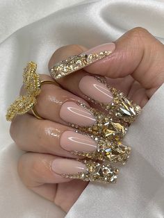 "Luxurious, Gold, Bling French tip Press on Nails with a soft pink base and a high-gloss top coat finish. Short (Lengths) are made without the large stones. Shape used in photo \"XLong Square\". ✨IMPORTANT:  ♥ 𝐌𝐲 𝐬𝐢𝐳𝐞𝐬 may 𝐝𝐢𝐟𝐟𝐞𝐫 𝐟𝐫𝐨𝐦 𝐨𝐭𝐡𝐞𝐫 𝐬𝐡𝐨𝐩𝐬 so please use my measuring methods that are found below or in the listing pictures above as there are no returns or exchanges in the shop. If you have any questions, you can message me anytime! Thank you, Candy ♥  WHAT YOU'LL RECIEVE WITH YOUR ORDER *Complimentary PREP KIT that includes nail glue, cuticle pusher, nail filer, alcohol wipe (1 prep kit per order) *10 Strong/Reusable nails CUSTOM ORDERS You can send me a message on a specific nail set you have in mind that you would like me to create or re-create.  I ♥ custo Gold Diamond French Tip Nails, Gold Bedazzled Nails, Gold Rhinestone French Tip Nails, Gold Gem Acrylic Nails, Gold Blinged Out Nails, Bling Press On Nails, Gold Diamond Nails, Gold Gem Nails, Nails With Stones