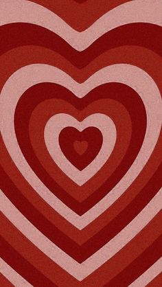 a red and white heart shaped pattern on a pink background with an orange stripe in the middle