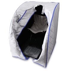 the inside of a white and blue tent with its door open on a white background