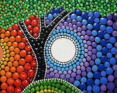 a colorful painting with circles and dots on it