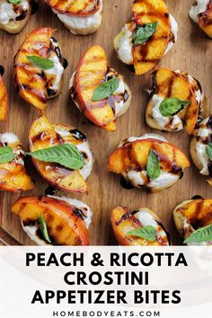 peach and ricotta crostini appetizer bites on a cutting board with basil leaves