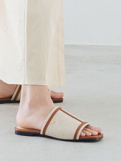 Editor's NotesSPUR's classic flat slides are wide so comfortable yet fashion-forward.- Light and natural canvas for comfort- Wearable daily for every look- Squared toe shape- Urethane cushion on the back insole- Non-slip thinly ribbed rubber outsole- Hand-madeMeasurements(in.)- Size: KR 225 MM - KR 250 MM- Heel Height: 0.39 in.Composition & Care- Canvas  Synthetic leather - Avoid direct heat and moisture- Do not wash- Avoid fire- Dry with a dry cloth when wet- Avoid direct sunlight- Pro Synthetic Leather, Sandal Espadrille, 2 Colours, Fashion Forward, Slides, Espadrilles, Heel Height, Women Shoes, Heels