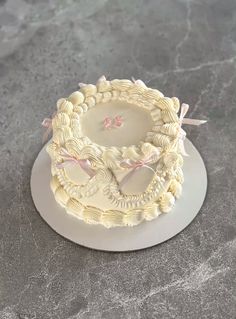 a white cake sitting on top of a table