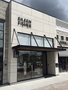 an empty store front on a cloudy day