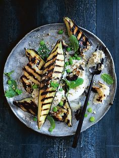 grilled eggplant and pea salad on a plate