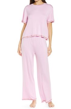 Short-sleeve pajamas in a blissfully soft knit you'll want to live in are traced with colorful embroidery. 21 1/2" top length; 28" inseam; 10 1/2" leg opening; 11 1/2" front rise; 14 1/2" back rise Top has crewneck; short sleeves Pants have drawstring waist 95% rayon, 5% spandex Machine wash, line dry Imported Comfortable Matching Sleepwear Set For Spring, Comfortable Matching Set Sleepwear For Spring, Casual Stretch Sleepwear Matching Set, Pink Loungewear Set With Elastic Waistband, Casual Loungewear Sleepwear For Spring, Casual Spring Sleepwear For Loungewear, Casual Spring Loungewear Sleepwear, Comfortable Relaxed Fit Sleepwear For Spring, V-neck Top With Elastic Waistband For Loungewear