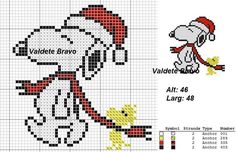 a cross stitch pattern with a cartoon character in the middle and an image of a santa hat