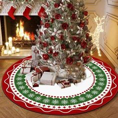 a decorated christmas tree with presents under it