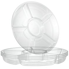 three clear plastic containers with lids on each side and one empty container in the middle