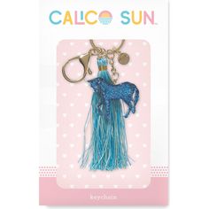 a keychain with a horse on it in the shape of a tassel