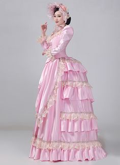 Women 19th Century Pink Lace Victorian Bustle Dress Color: Pink   Material: This dress made of High Quality Satin, soft,smooth and comfortable to wear  Sleeve Length:  Long Sleeve  Dresses Length:Floor Length  Neckline:  Square Collar  Decoration: Ruffles + Lace  Package Includes:  Dress + Hat   The length of skirt about 45 inches (114 cm) long from waist to hem regardless of size. This dress is pictured with a 6-hoop skirt Petticoat underneath to achieve the look. Petticoat are NOT INCLUDE Pink Feminine Dress For Costume Party, Feminine Pink Dress For Costume Party, Pink Ball Gown Dress For Costume Party, Feminine Ball Gown With Ruffles, Feminine Ball Gown Dresses With Ruffles, Feminine Ruffled Ball Gown Dresses, Pink Floor-length Dress For Costume Party, Pink Fitted Victorian Dress For Costume Party, Pink Ruffled Costume Dress