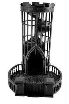 a black and white photo of a birdcage in the shape of a castle