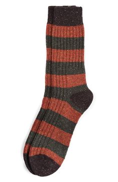 Slightly chunky and cold-weather comfortable, these socks made with soft wool feature rings of colorful stripes and thick ribbing stretching from tops to toes. Wool/acrylic/nylon/elastane Machine wash, tumble dry Made in Portugal Wool Blend Socks, Stripe Socks, Barbour Mens, Concept Clothing, Jackets Uk, Wellington Boots, Pyjama Bottoms, Wide Stripes, Flip Flop Shoes