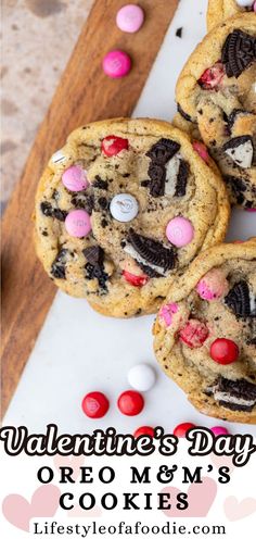 valentine's day oreo m & m's cookies on a cutting board