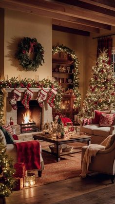 a living room decorated for christmas with red and green decorations on the fireplace mantles