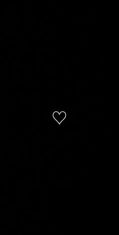 a black background with a white heart in the middle