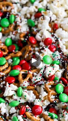 a close up of a plate of food with pretzels and candy caned