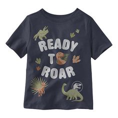 Perfect for dinosaur fans, this little boys' Jurassic World graphic t-shirt is made from a jersey cotton-blend. It features a regular-fit, a crew neck, and short sleeves. Team it with shorts and sneakers. Character: Jurassic WorldClosure Type: Pullover HeadFit: Regular FitNeckline: Crew NeckSleeve Length: Short SleeveFiber Content: 50% Cotton, 50% PolyesterFabric Description: JerseyCare: Tumble Dry, Machine WashCountry of Origin: Imported Kids T Shirt Design Ideas, Kids Tshirt Designs, Dinosaur Tshirt, World Graphic, Kids Tee Shirts, Tops Graphic, Boy Tees, Jurassic World, Kid Tees