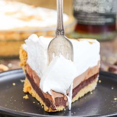 there is a piece of cake on the plate with a fork