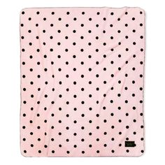 a pink and black polka dot blanket