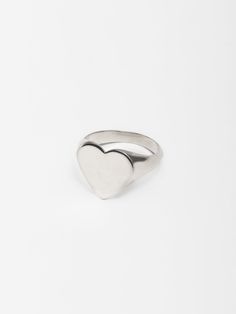 A memorable bold signet in an oversized heart shape, this solid ring will become a unique heirloom in your collection. The lustrous high polished silver brings a regal quality to your look, playful and elegant all at once. Sterling Silver XL Heart Signet Ring Heart Face measurements: 14mm × 15mm Made in L.A. Globally Sourced Materials Heart Silver Ring, Heart Signet Ring, Jewerly Ring, Jewelry Wishlist, Clothing Wishlist, Face Measurements, Silver Heart Ring, Ring Heart, Heart Face