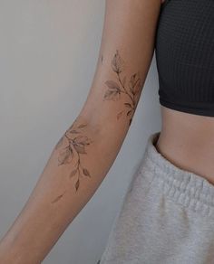 Tattoo inspo Tattoos Wrist Wrap Around, Around The Arm Flower Tattoo, Floral Shoulder Cap Tattoo Fine Line, Floral Leaf Wrap Tattoo, Marigold Wrap Around Tattoo, Floral Biblical Tattoo, Dainty Vine Tattoo Arm, Flowery Vine Tattoo, Upper Arm Cuff Tattoo