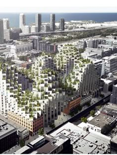 an aerial view of a city with tall buildings and lots of trees on the roof