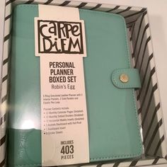 a personal planner in a box with the label labeled'carpel & delem '