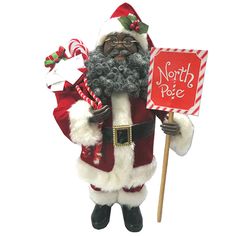 a santa clause holding a sign and candy canes