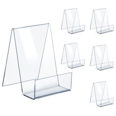 six clear acrylic displays on white background