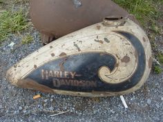 an old baseball bat laying on the ground