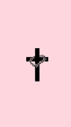 a black cross on a pink background