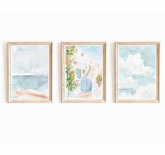 three watercolor paintings hanging on the wall