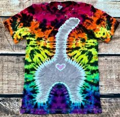 a tie - dyed t - shirt with an elephant on it