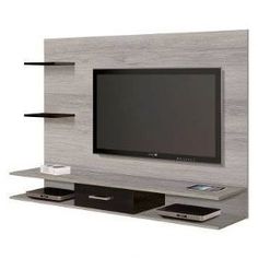 a flat screen tv mounted to the side of a wall