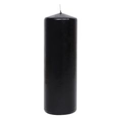 a black pillar candle on a white background