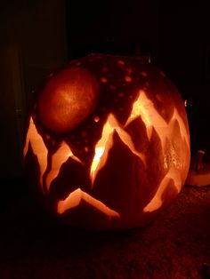 a carved pumpkin sitting on top of a table