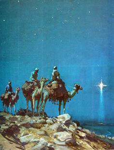 three men riding camels on top of a rocky hill under a star filled sky