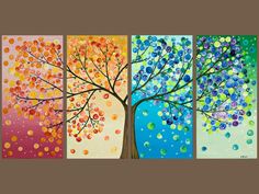 four different colored paintings of trees with leaves on the bottom and one tree in the middle