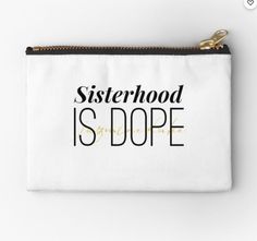 a white zipper pouch with the words sisterhood is dope on it