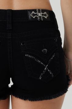 Mid-rise, black denim shorts with frayed hems- Simple embroidered cross-stitch design with M logo - Faux flap pocket with rhinestone rivets - Embossed black leather cross Miss Me brand patch - 5-pocket design Model is wearing size: 25Model Measurements:Height: 5'9" Bust: 32"Waist: 26" Hips: 35" Fabric Content: 70% Cotton, 20% Polyester, 8% Rayon, 2 % Spandex Care: Gentle machine wash inside-out with like colors in cold water. Tumble dry low. Style No. M3444H115-B01 Shorts Black, Clothes Grunge, Y2k Black High Waist Jean Shorts, Black Mid-rise Grunge Shorts, Y2k Black Jean Shorts, Y2k Jean Shorts With Built-in Shorts For Summer, Y2k Mid-rise Denim Shorts, Miss Me Shorts, Low Rise Shorts