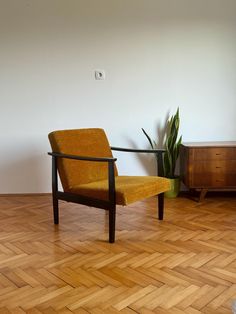 1 of 2 Vintage Wooden Yellow Armchairs / Mid century Lounge Chair / Uphosltered Accent Chair / Made in Yugoslavia / 1960s Crafted with care at the JASEN KRALJEVO factory in Yugoslavia during the 1960s, these stunning armchairs exude timeless charm. Their original condition adds a touch of authenticity, making them a unique addition to any living space. The elegant wooden frame, adorned in a sleek black finish, offers durability and a classic aesthetic. The luxurious mustard yellow textile upholstery complements the design, adding a pop of color and warmth to the room. Elevate your home decor with these exquisite armchairs that seamlessly blend style and comfort, making them a statement piece in any room they grace. -The price is valid for one armchair. For more great vintage pieces, visit Yellow Armchair, Vintage Armchair, Mid Century Lounge, Mid Century Lounge Chairs, Yellow Chair, Mid Century Armchair, Classic Aesthetic, Living Room Furniture Chairs, Armchair Vintage