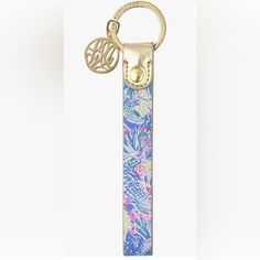 a keychain with a flower design on it