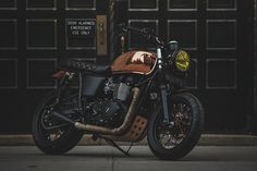 a motorcycle parked in front of a building