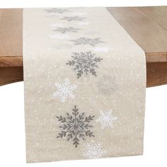 Embrace the enchantment of winter with this Snowflakes Table Runner. Delicately adorned with intricate snowflake designs, it adds a touch of seasonal charm to your table. Crafted with care, this runner sets the stage for cozy gatherings and creates a festive and inviting atmosphere. Welcome the beauty of the season with this exquisite snowflakes table runner. Winter Table Runners, Snowflake Table Runner, Winter Table Runner, Intricate Snowflake, Heritage Lace, Modern Holiday Decor, Winter Table, Burlap Table Runners, Needle Point