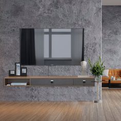 a living room filled with furniture and a flat screen tv mounted to the side of a wall