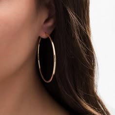 Curate her collection of versatile accessories with these continuous tube hoop earrings, a classic look that pairs well with her casual and dressy attire. Crafted in 14K gold Each simple earring gleams with a 50.0 x 2.0mm continuous tubular hoop. These earrings make a great fashion staple. These hoop earrings secure with hinged backs. Womens Hoop Earrings, Golden Hoop Earrings Aesthetic, Gold Hope Earrings, Hoop Earrings Aesthetic, Gold Hoops Earrings, Emily Prentiss, Tube Hoop Earrings, Dressy Attire, Golden Hoops