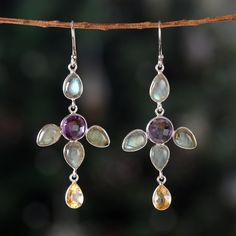 The mystic hues of the labradorite stone transform these dangle earrings into a display of enchanting elegance. Presented by Alok Jain of India, these sterling silver earrings combine the labradorite gems with amethyst and citrine jewels, creating a palette of celestial hues that total over eight carats. Amethyst And Citrine, Citrine Jewelry, Traditional Earrings, The Mystic, Labradorite Earrings, Silver Dangle Earrings, Amethyst Jewelry, Sterling Silver Dangle Earrings, Amethyst Earrings